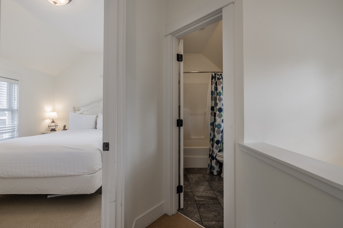Right off the primary bedroom, the shared bathroom is conveniently located