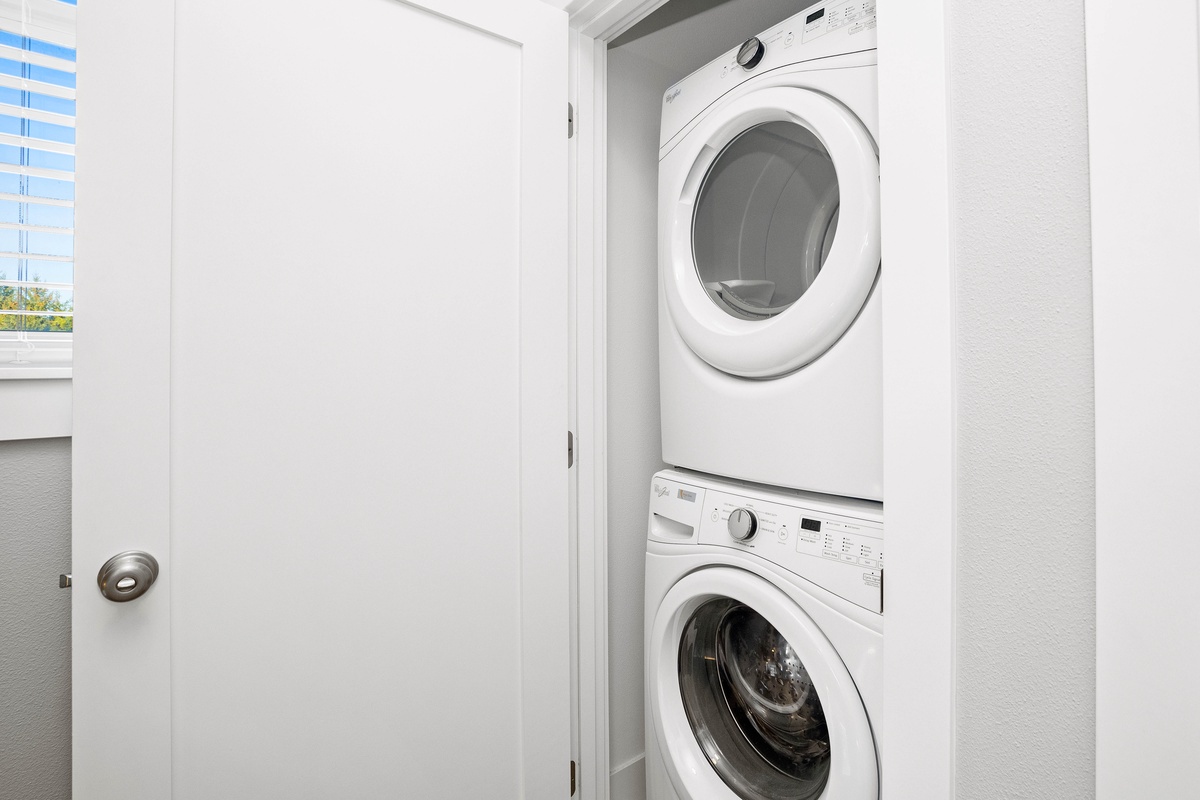 Stacked washer and dryer upstairs