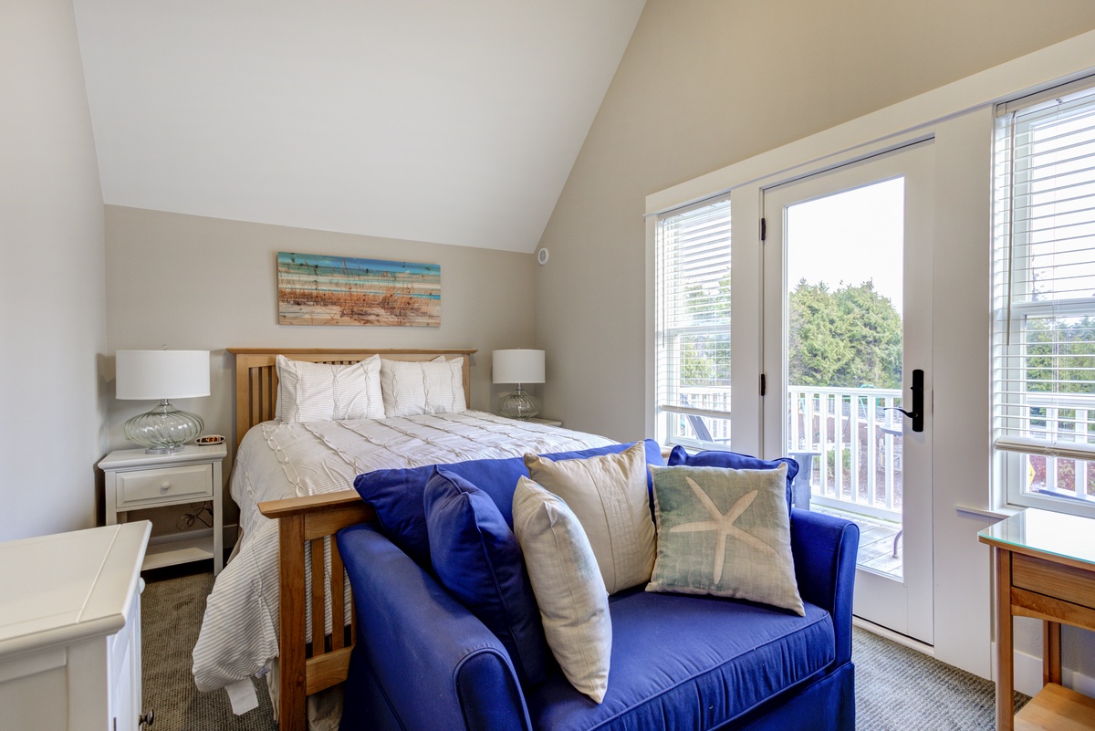 Second floor primary bedroom with balcony