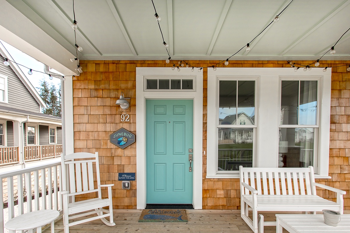 Covered porch with ambient evening lighting