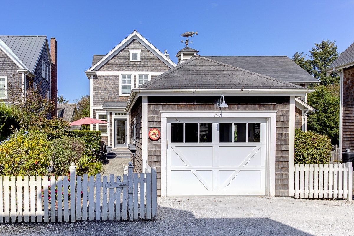 The detached garage doubles as a game room