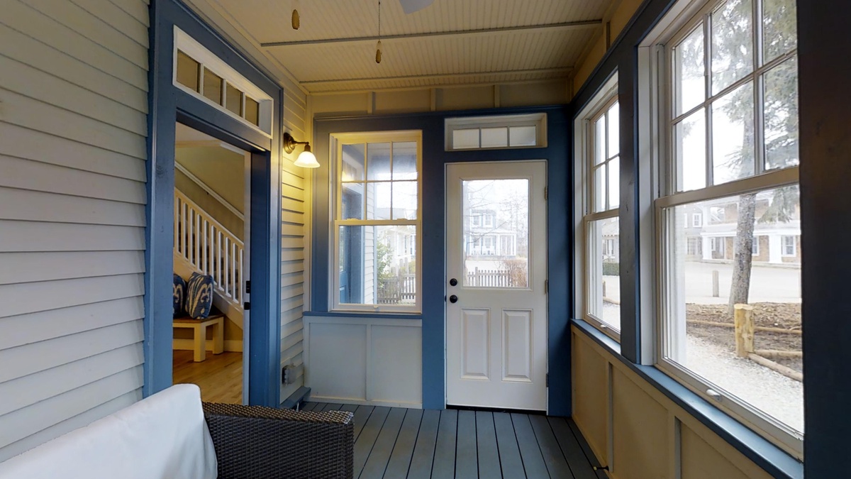 Enjoy the charm of the enclosed front porch