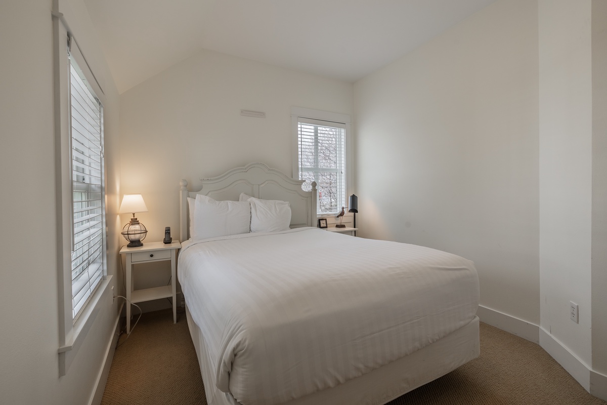 Sweet dreams happen in the cozy primary bedroom