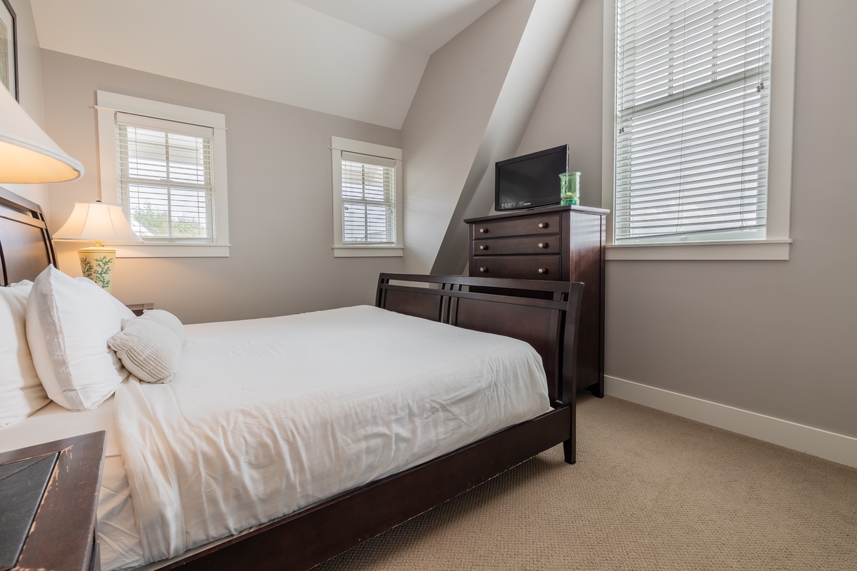 King bedroom with TV