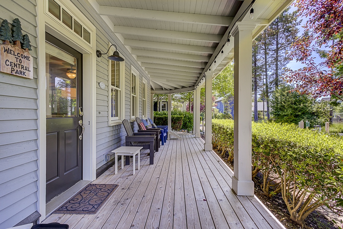 Covered front porch with view of Crescent Park