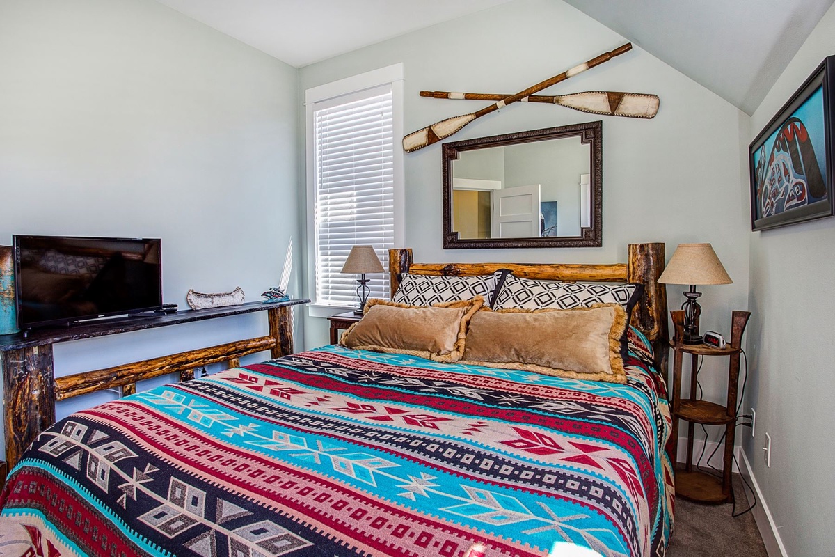 Queen bedroom with flat screen TV