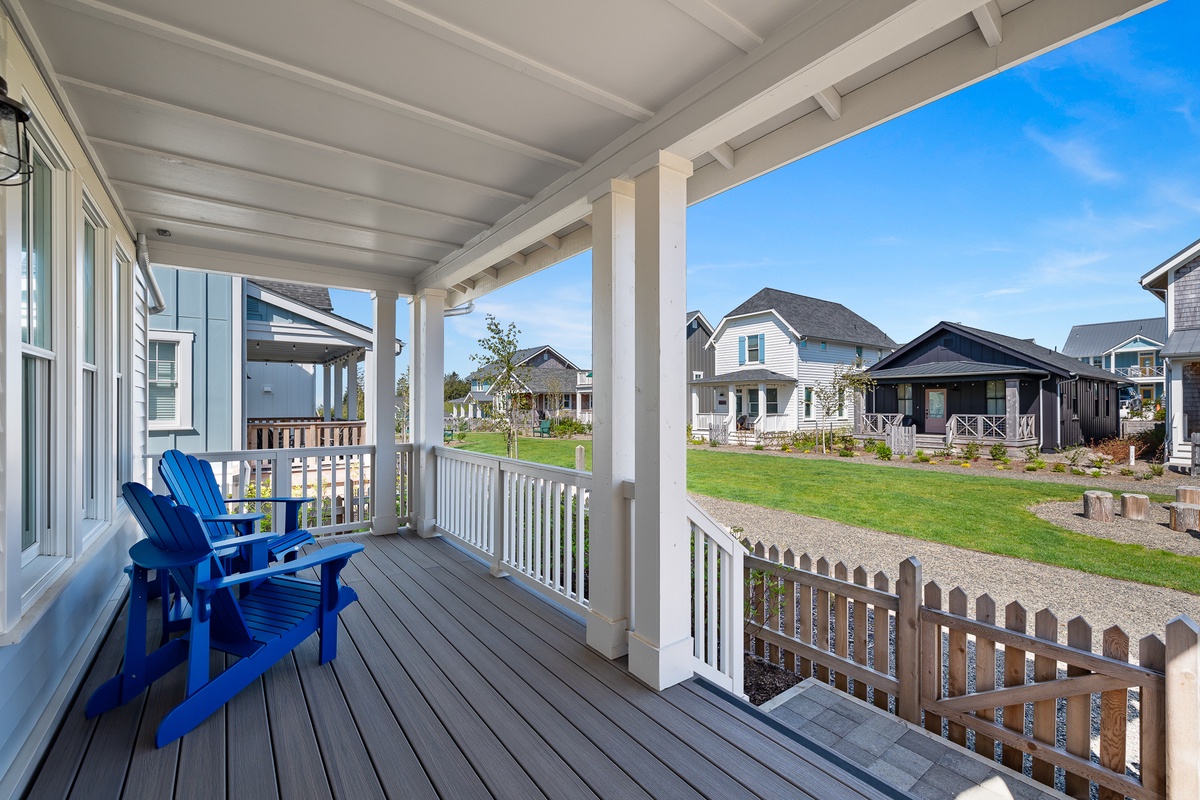 Covered front porch with park views