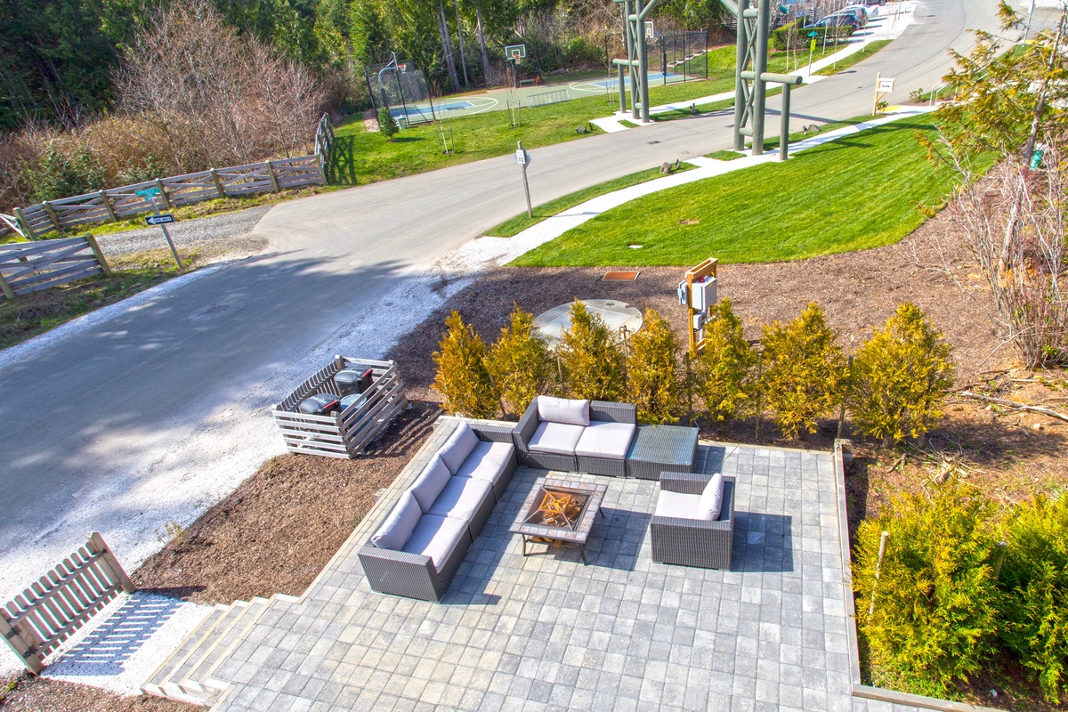 Large patio with fire pit and tons of seating