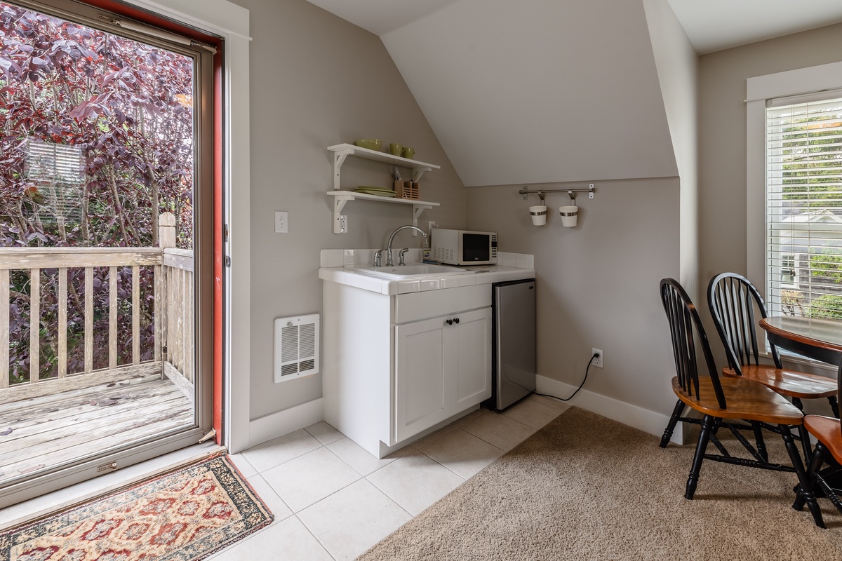 This cozy kitchenette has everything you need for a delightful stay