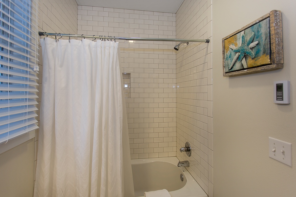 The shared bathroom is designed for comfort and ease during your stay