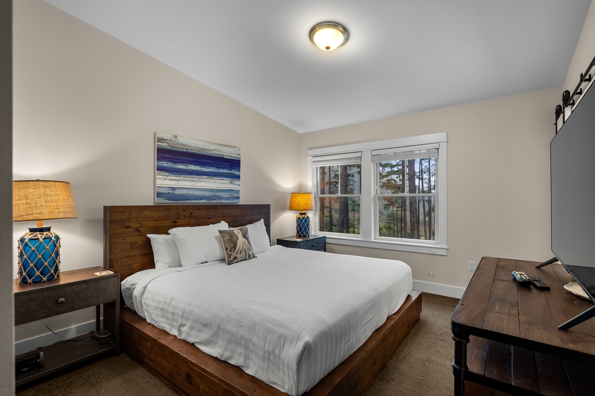 Third floor primary bedroom with ocean view