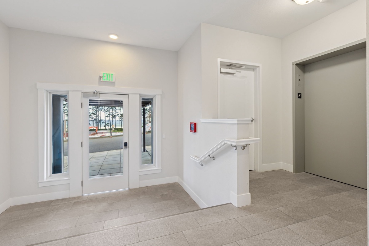 Entry with ramp access to elevator