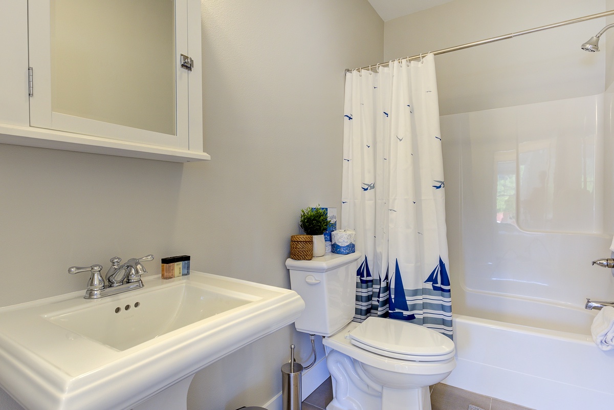 Conveniently located full guest bathroom on the main floor