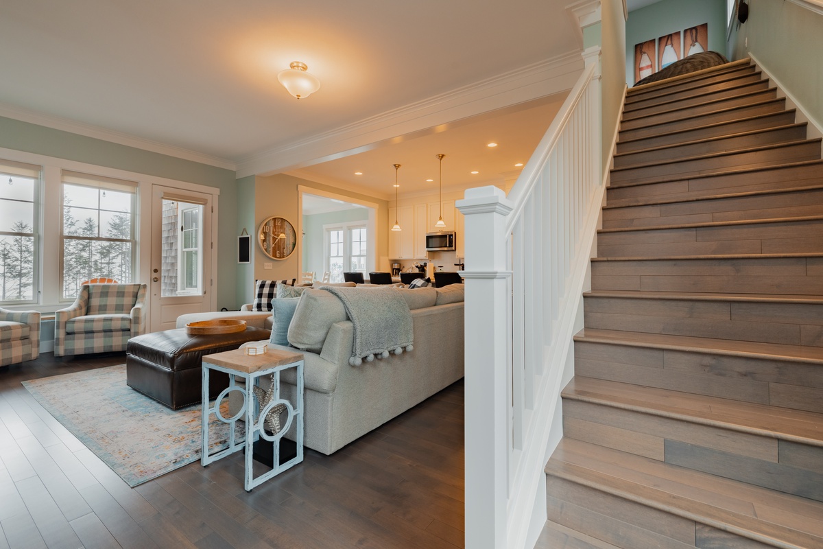 Stairs to more bedrooms and media room