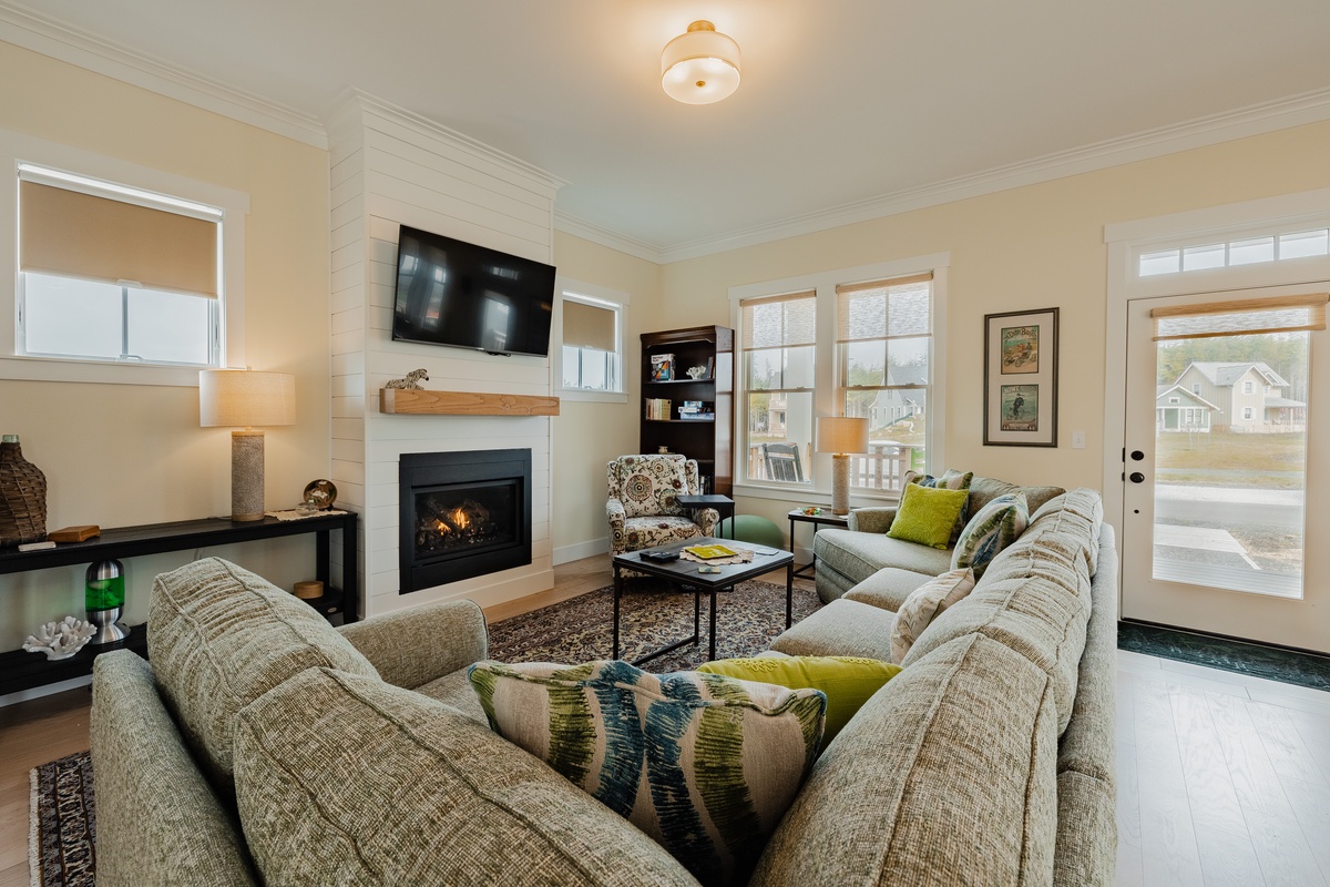 Enjoy the warmth of the gas fireplace while watching your favorite shows on the  smart TV