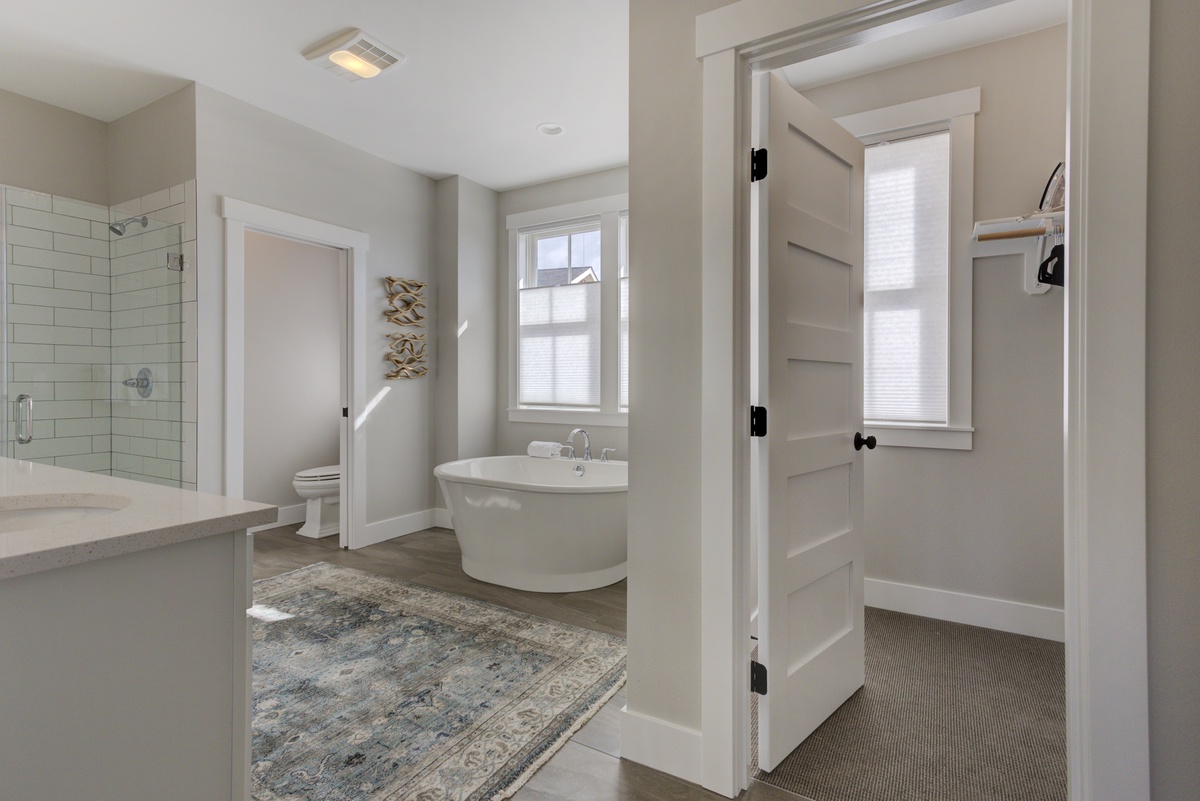 Private bathroom with walk in closet