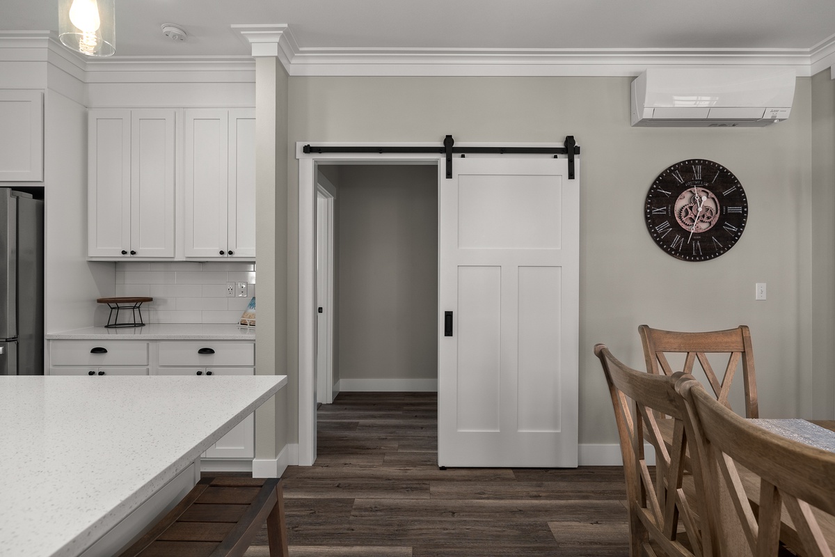 Sliding barn doors reveal the bedrooms