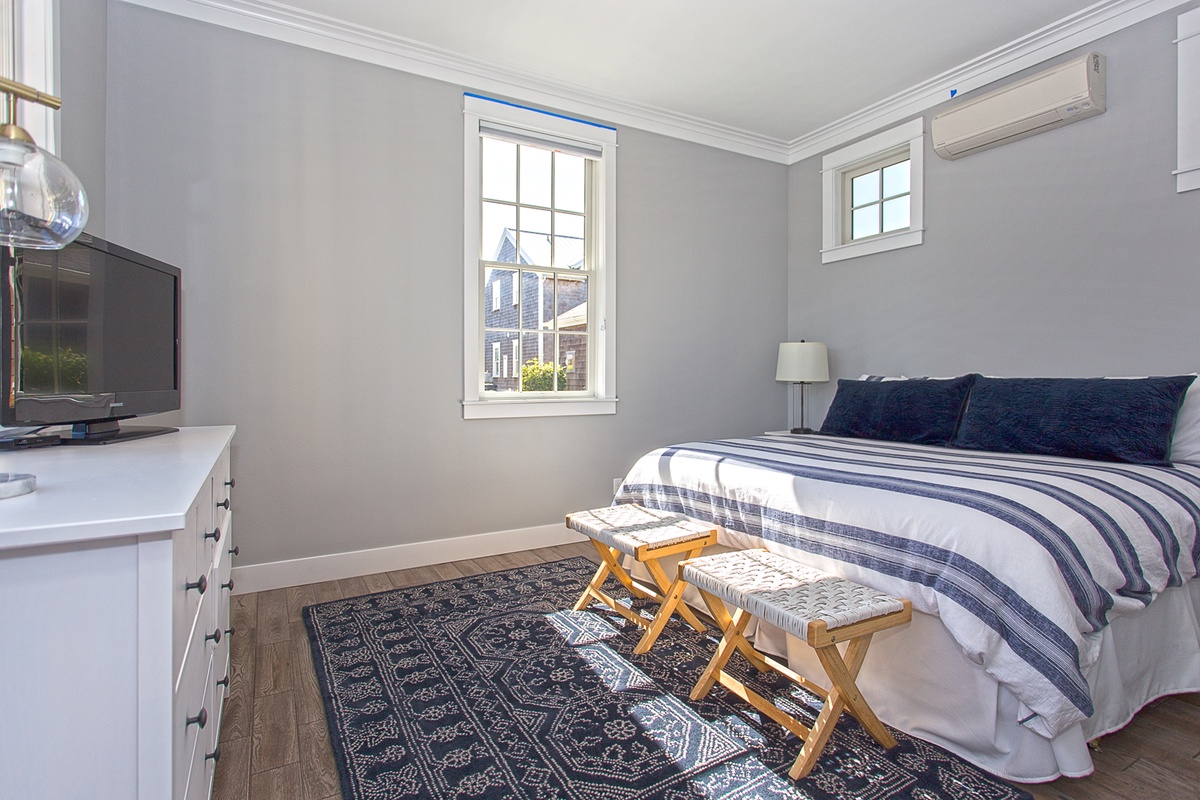 Main floor California king bed is perfect for a great night's sleep