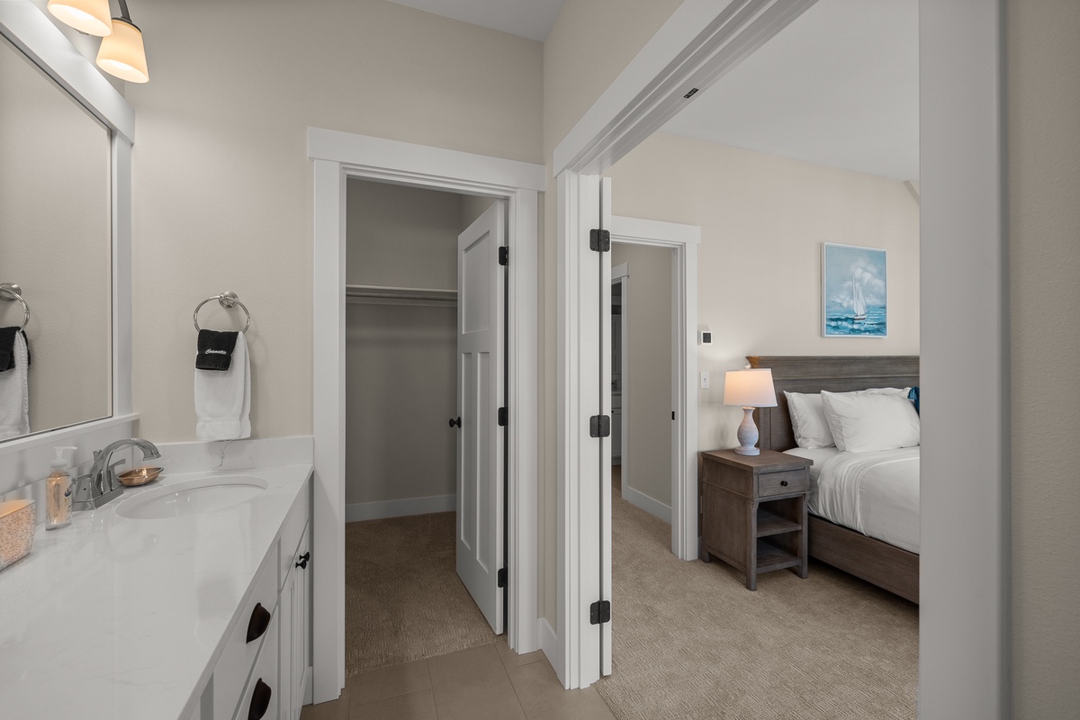 Ensuite bathroom with walk-in closet