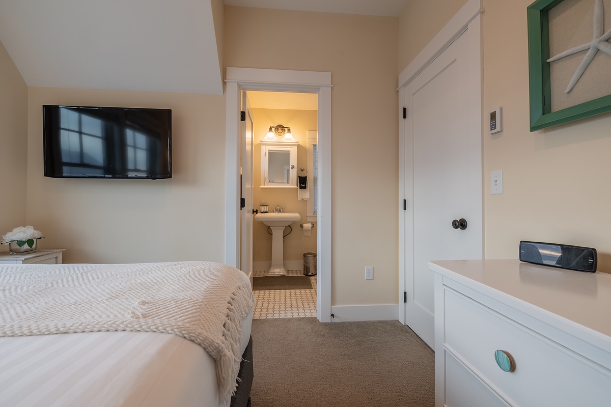 Primary bedroom with ensuite bathroom