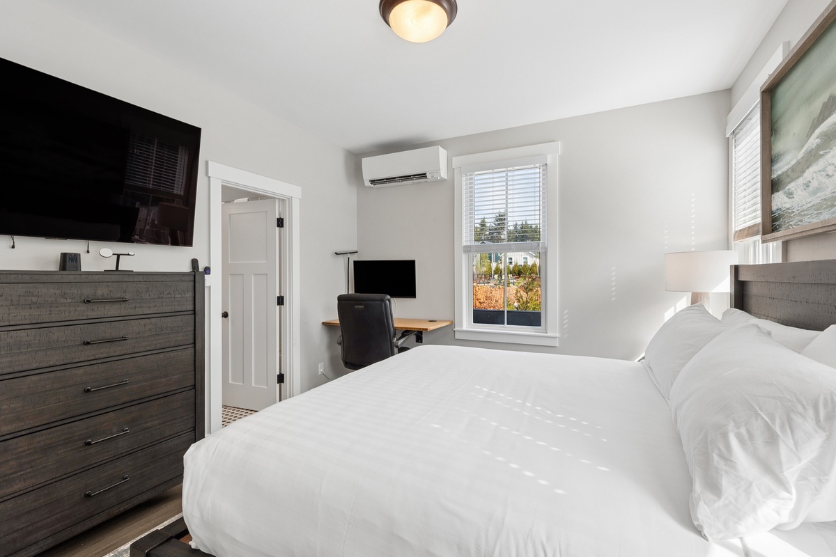 Primary king bedroom with dedicated office space