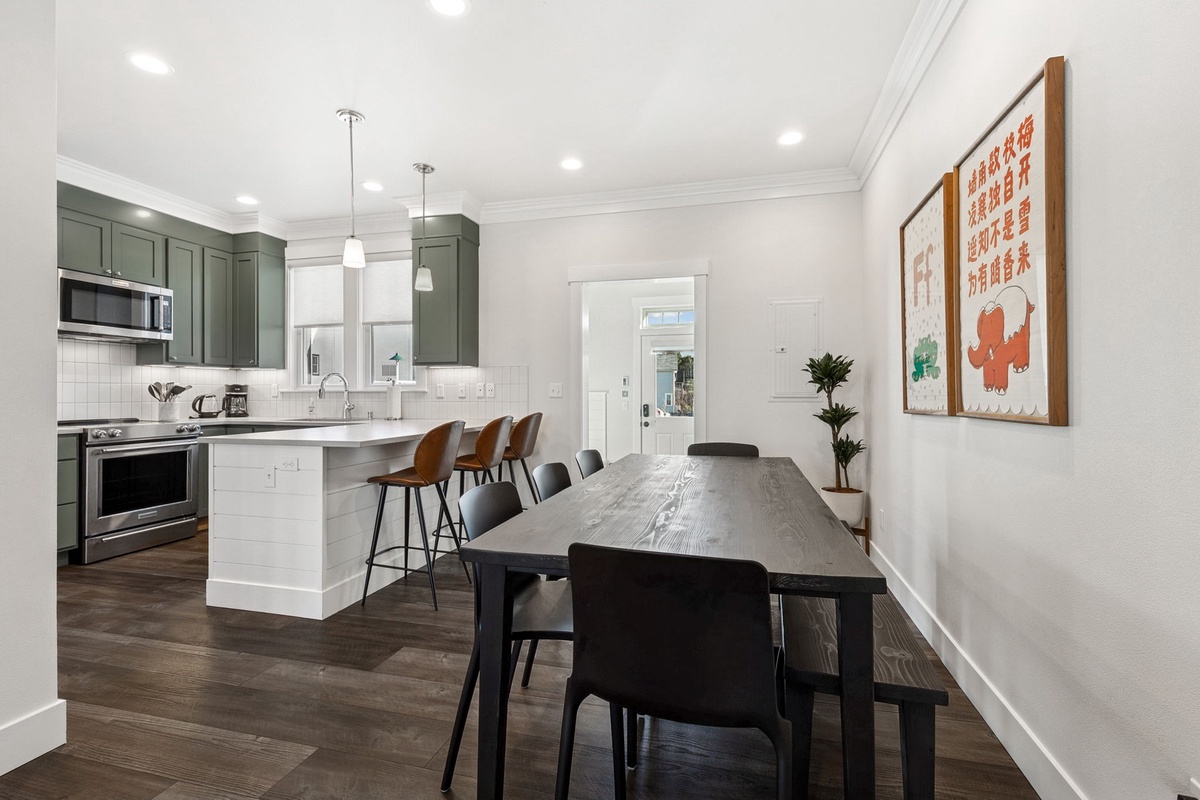 Living room flows into dining and kitchen