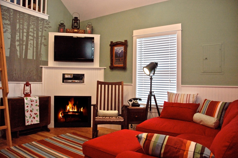 Relax in the cozy living room with the fireplace and TV