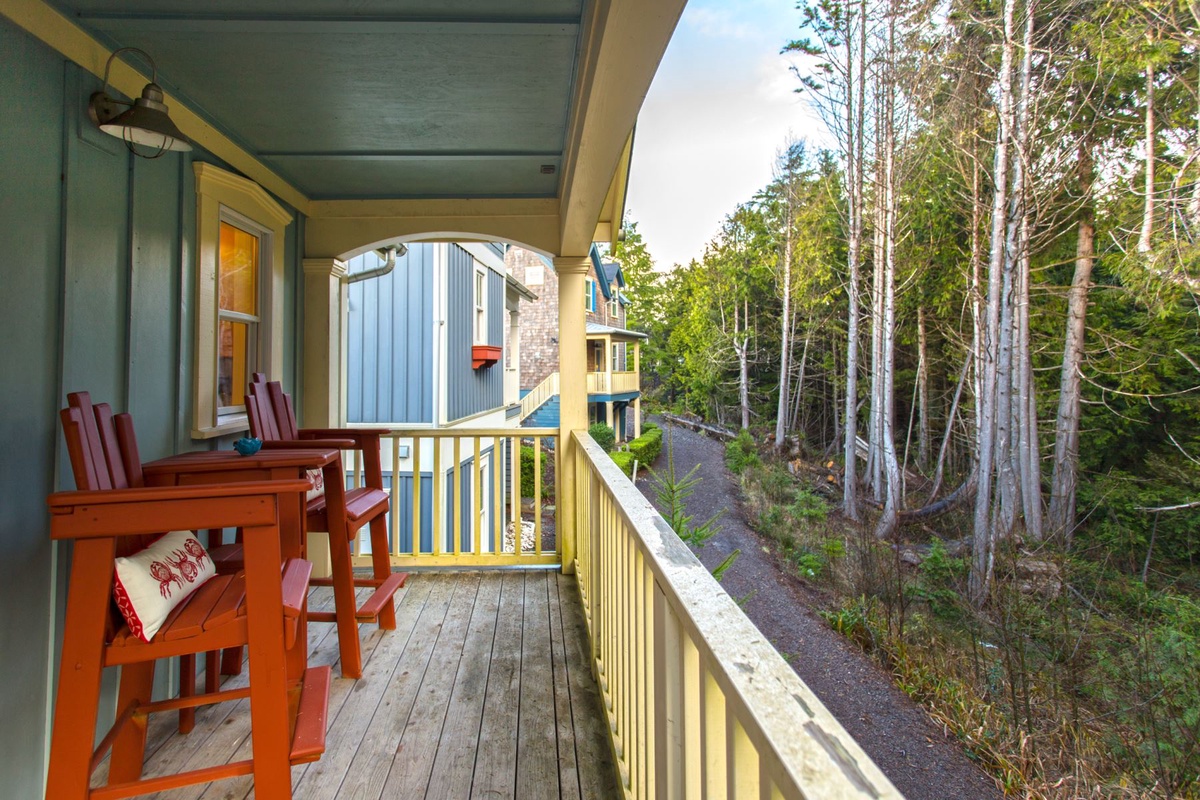 Balcony with seating and forest view