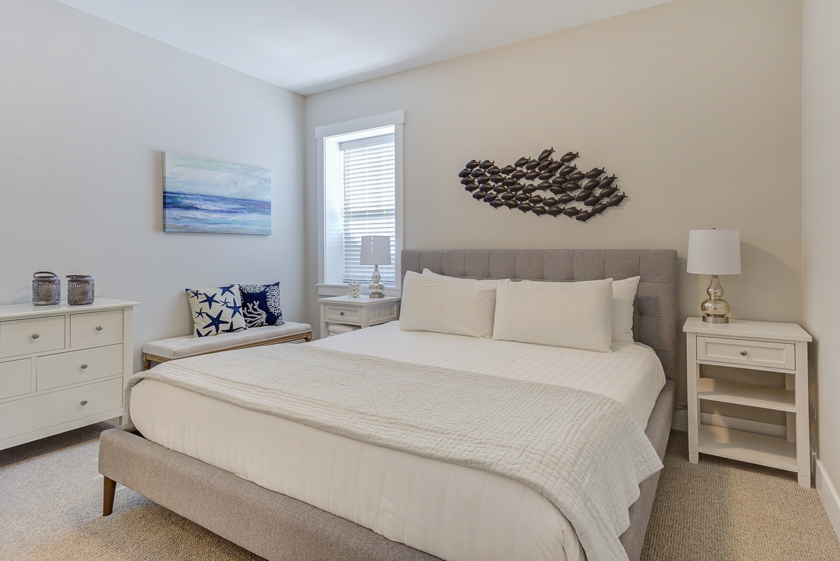 Cozy primary bedroom with ensuite bathroom