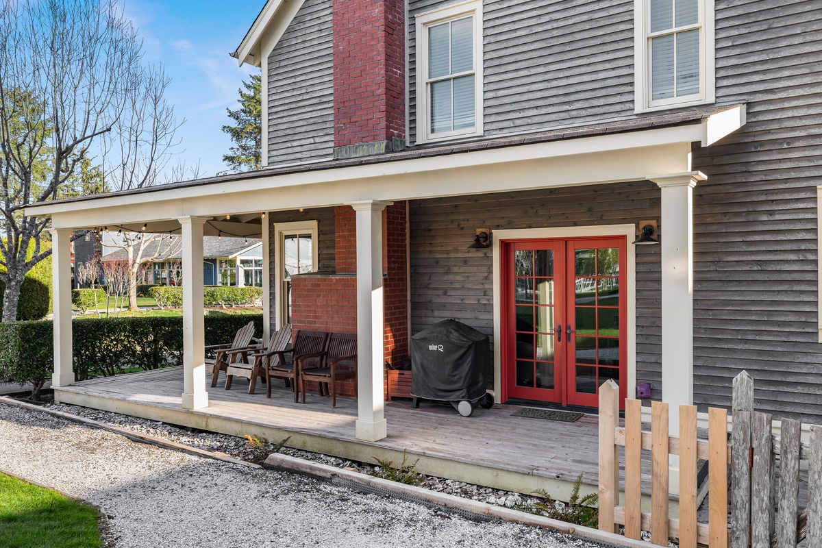 covered porch with gas grill