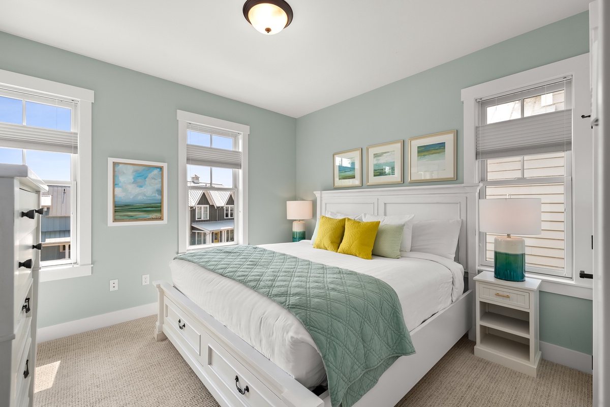Primary king bedroom with ensuite bath offers a restful and refreshing stay