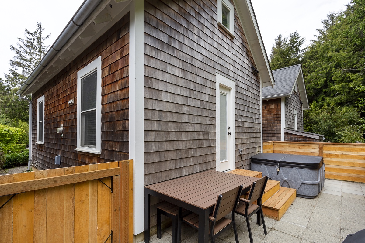 Private back patio with bbq hot tub and outdoor seating
