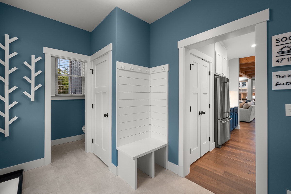 The mudroom has lots of hooks and storage