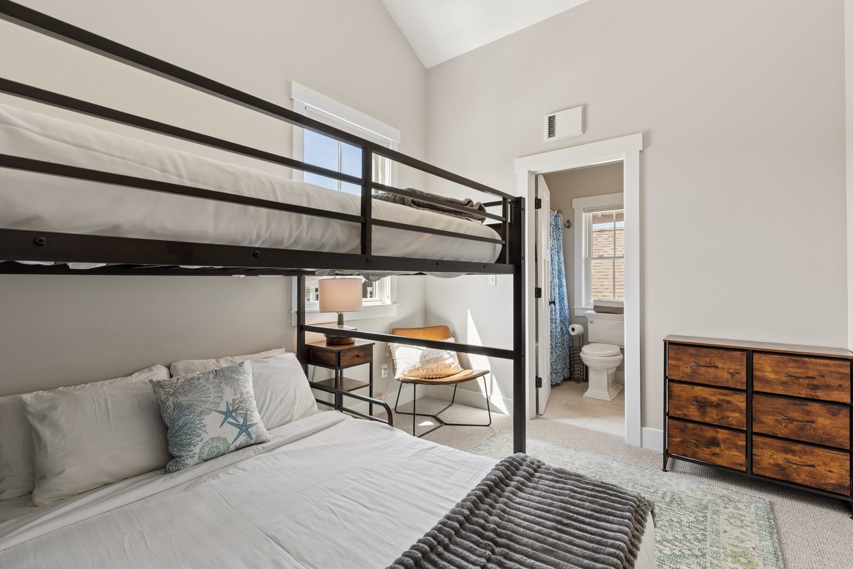 Bunk bedroom with attached bathroom