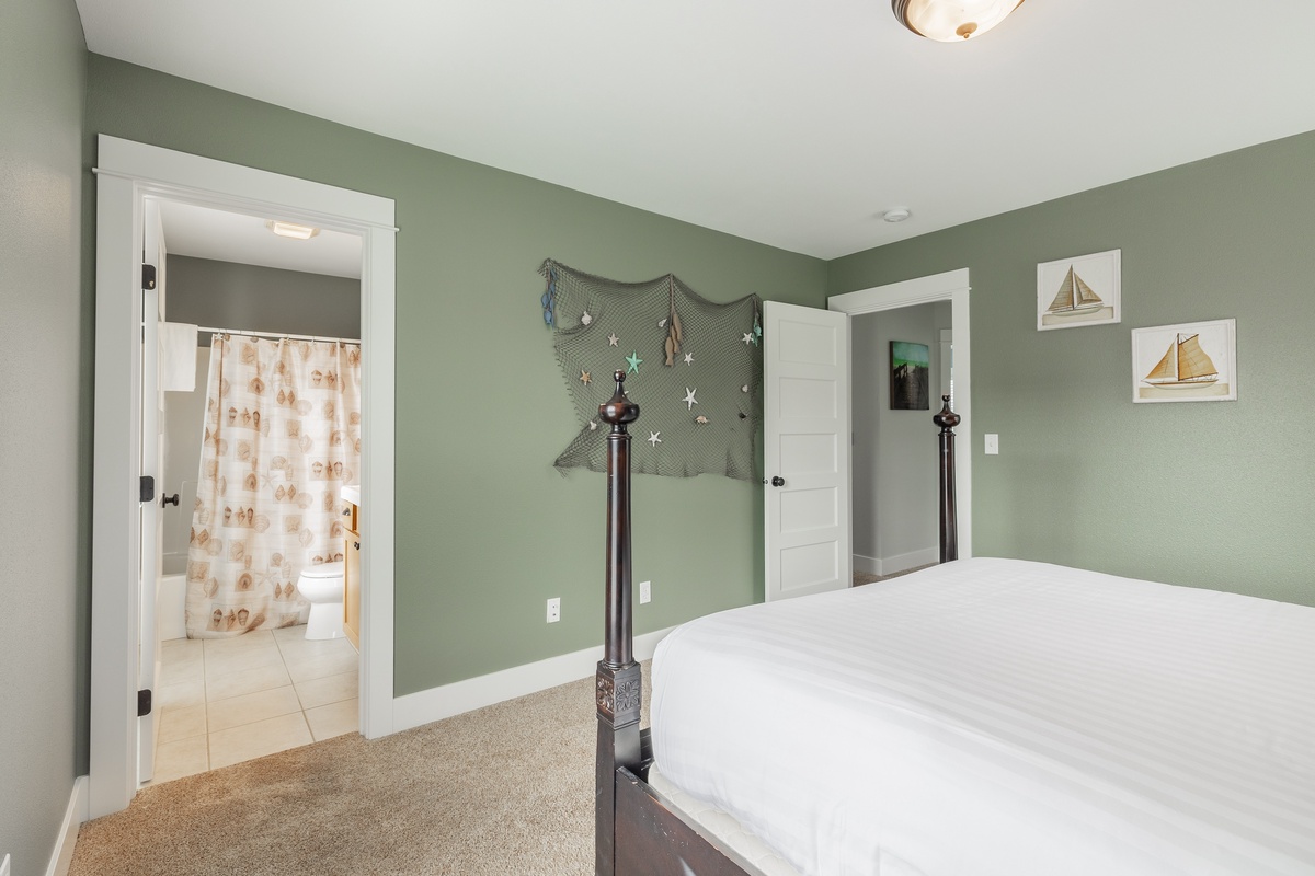 The queen bedroom with ensuite bathroom is the perfect place to unwind