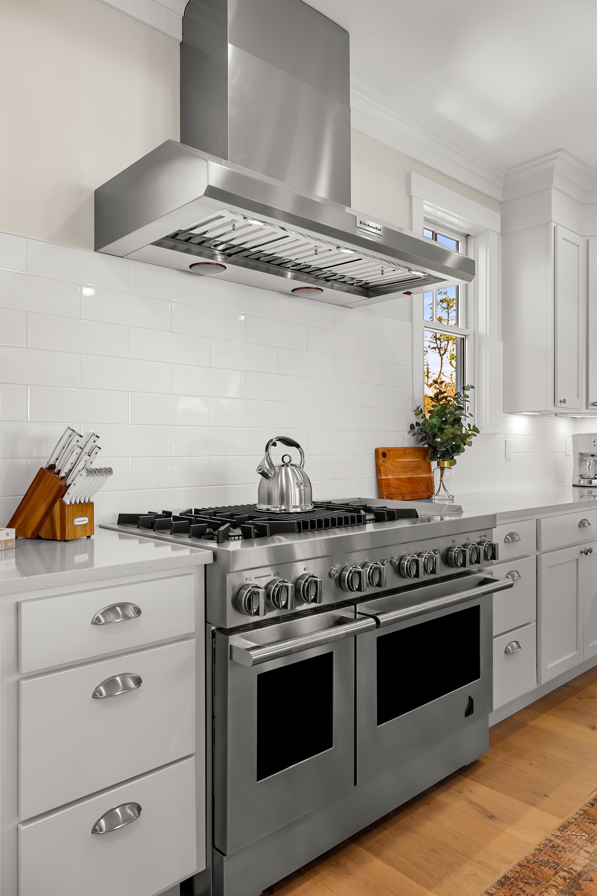 six-burner range with griddle and dual ovens