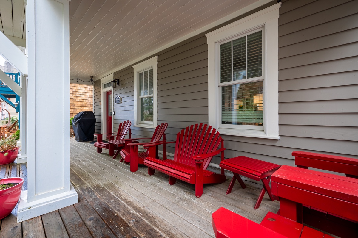 Sit back, unwind and enjoy the fresh air on the inviting front porch
