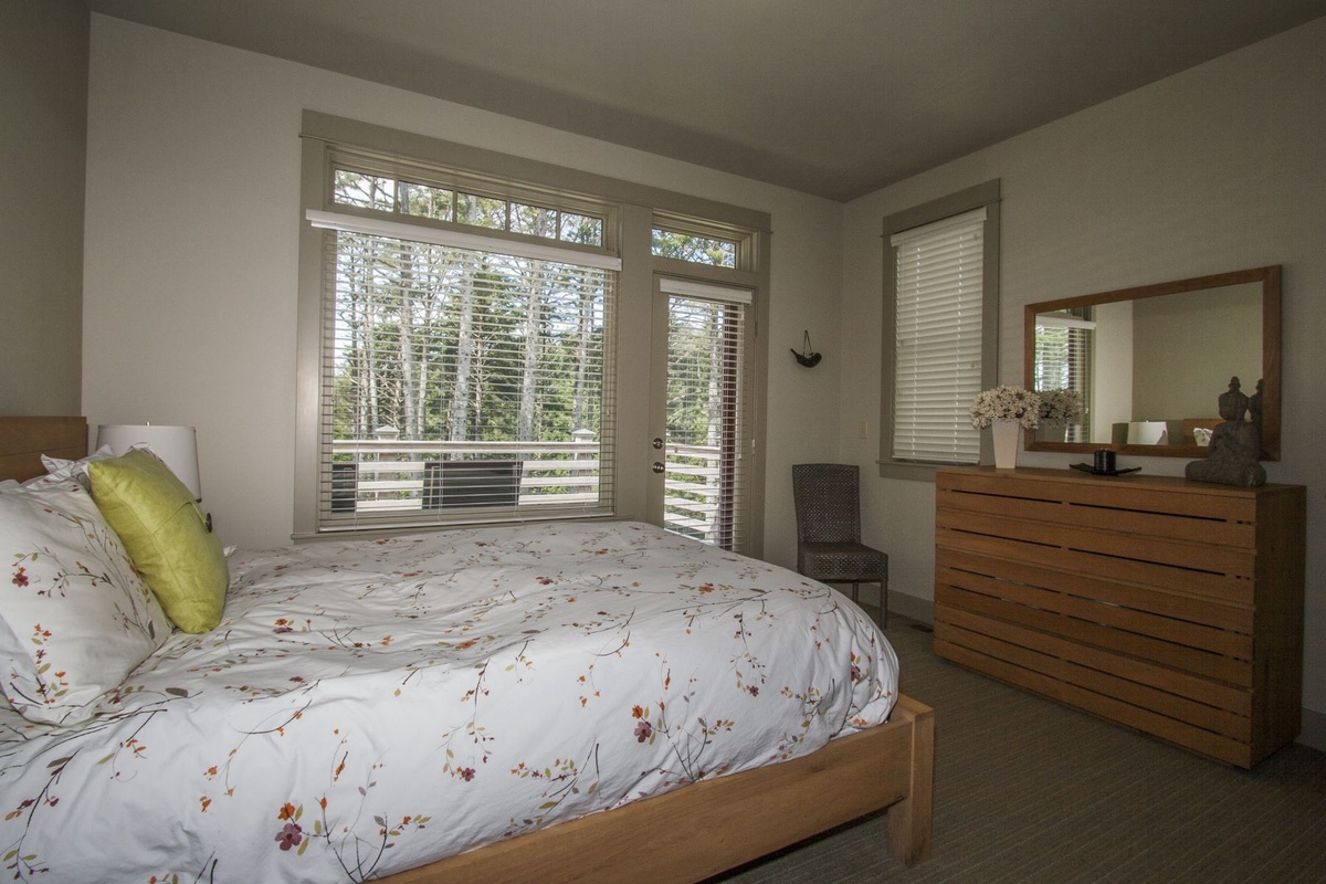 Queen bedroom with private entrance to second floor deck