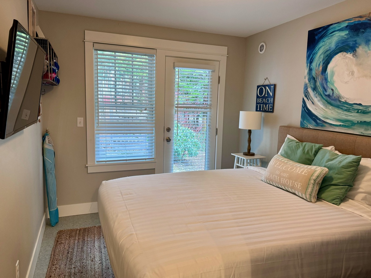 Downstairs queen bedroom is designed with relaxation in mind