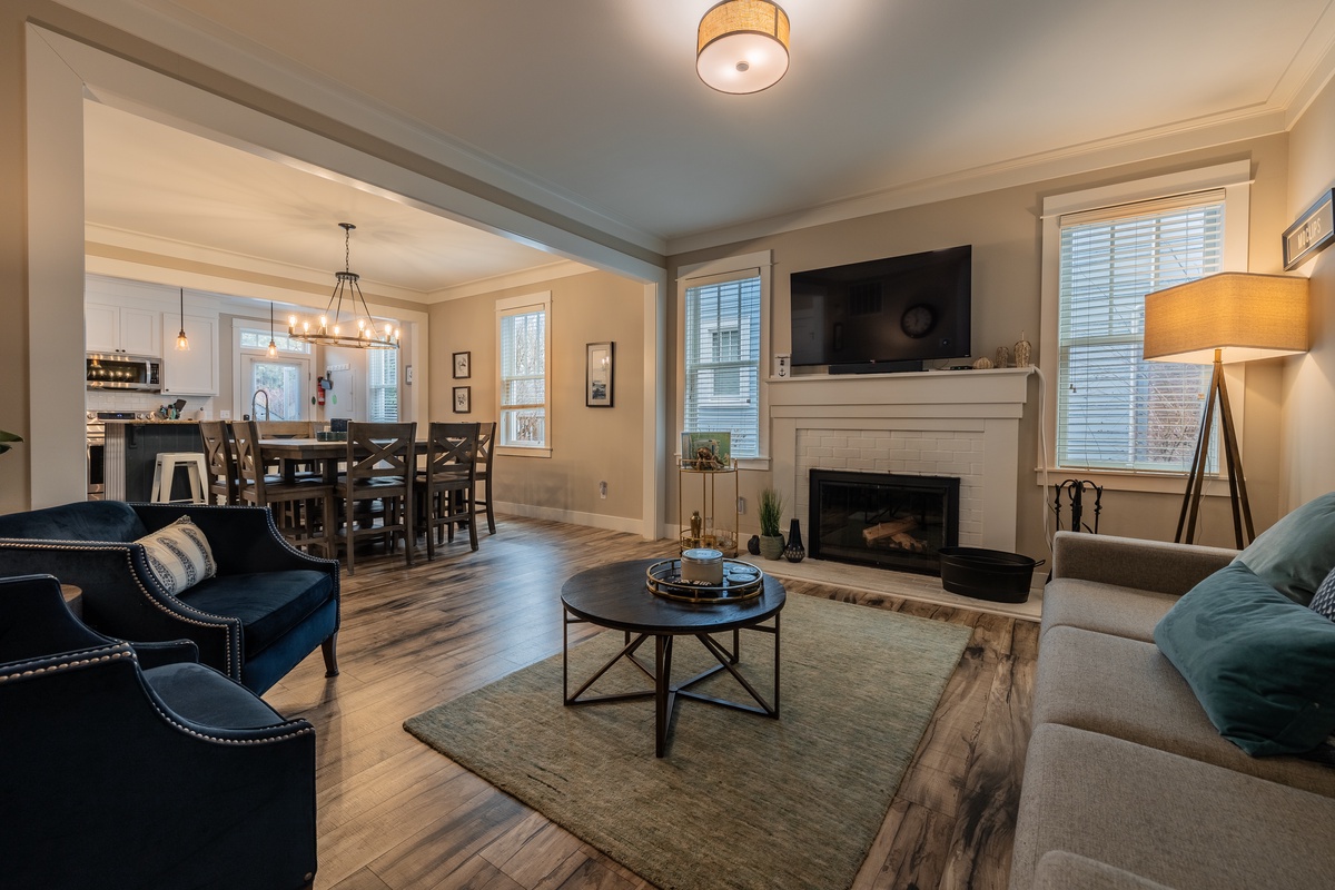 Cozy up by the warm glow of the wood fireplace