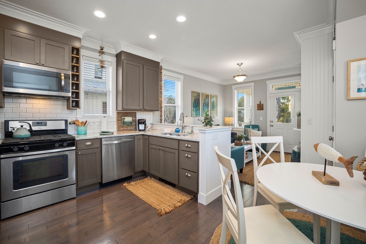 Open-concept kitchen, living and dining rooms