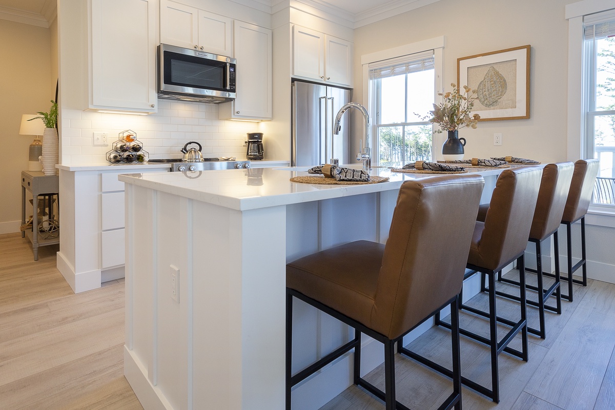 The kitchen island provides ample prep space
