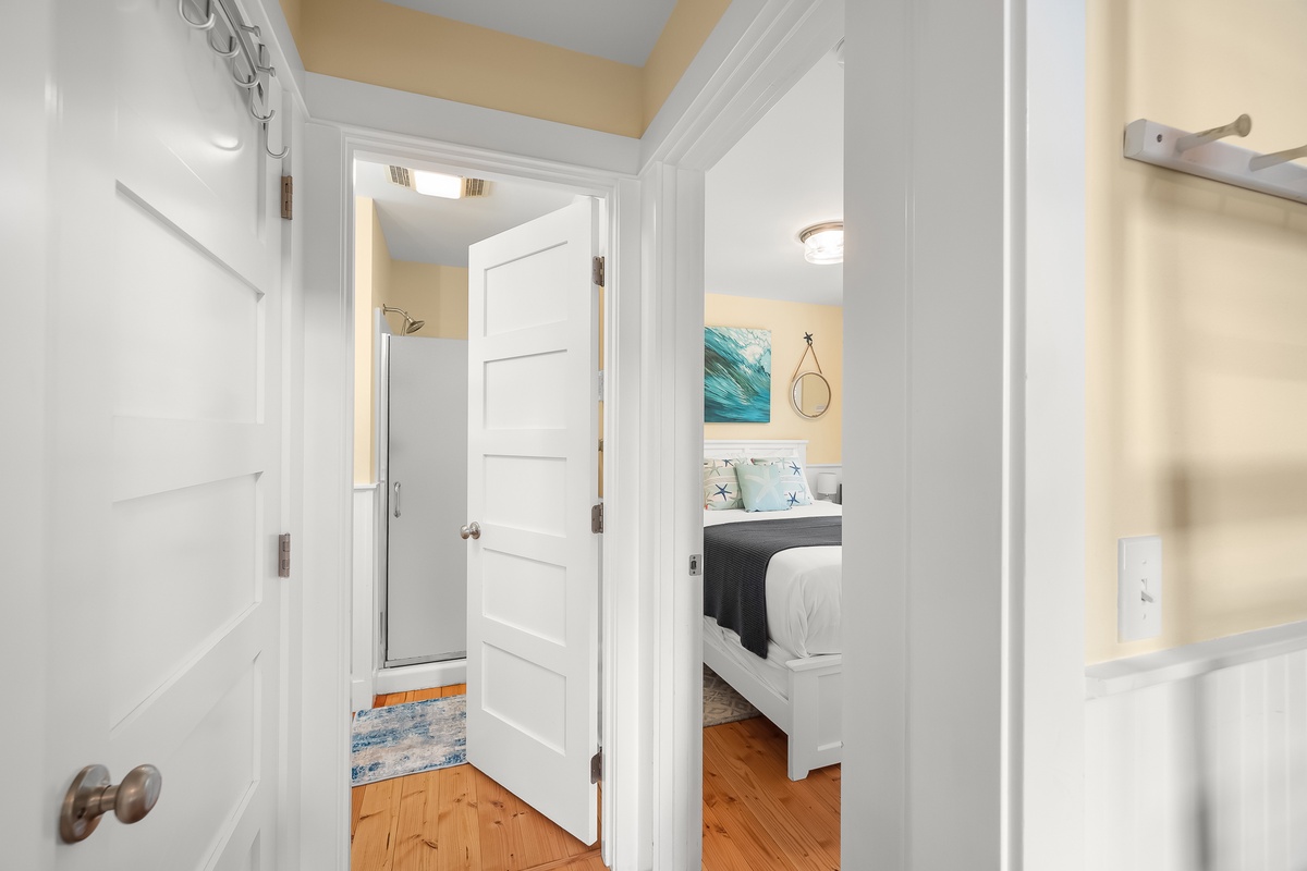 shared bathroom and primary bedroom