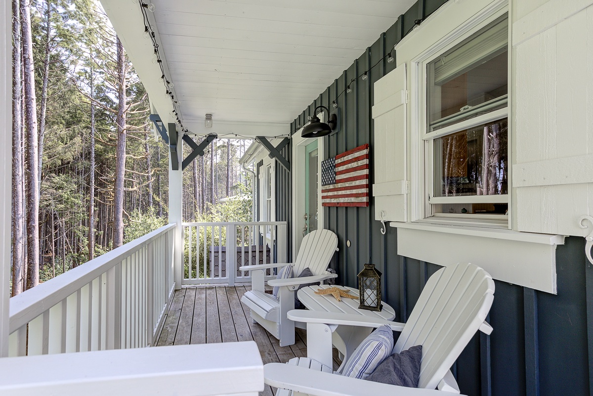 covered balcony with forest view