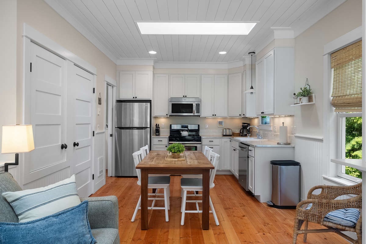 Open concept kitchen, living and dining spaces