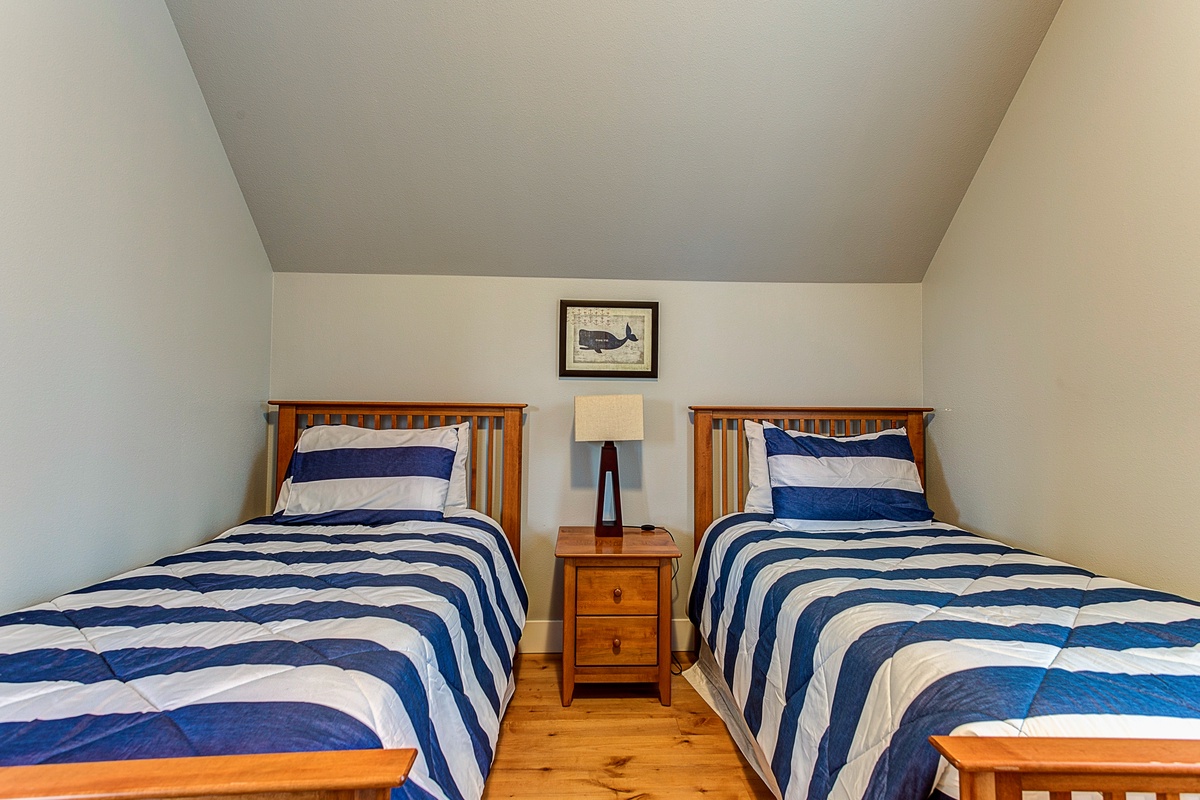 Second floor twin beds with end table