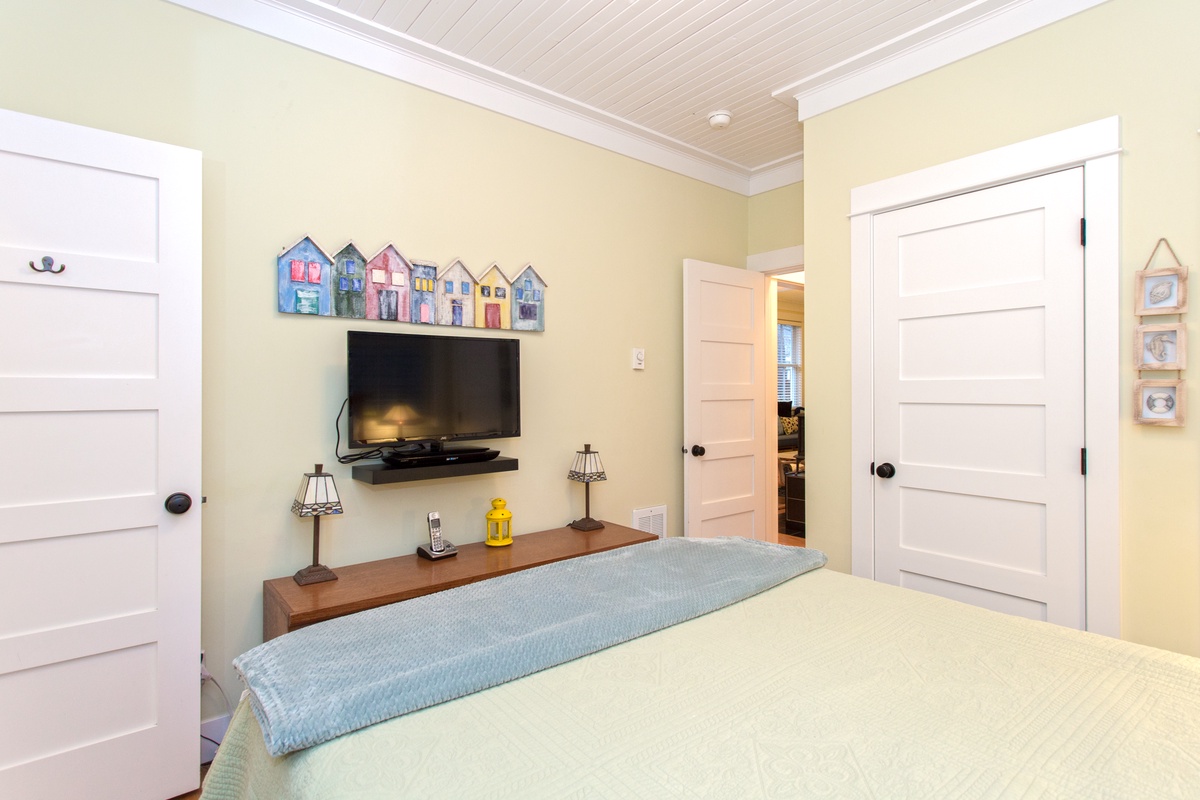 Cozy bedroom with a flat-screen TV