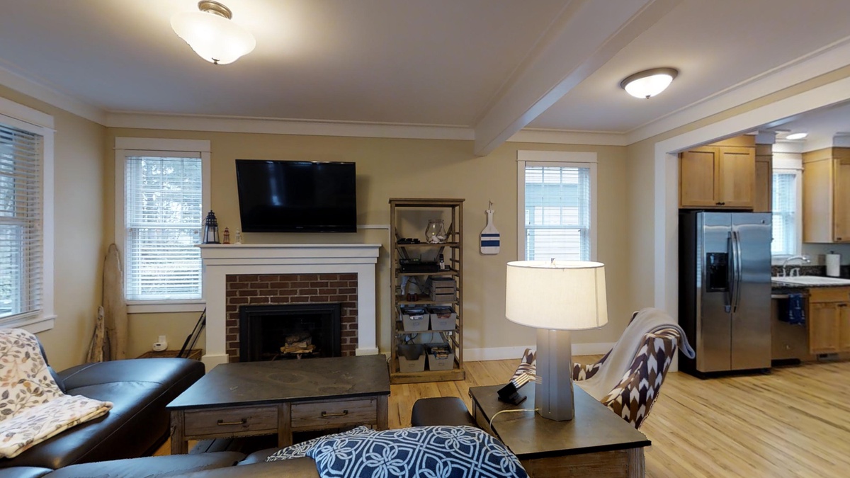 Wood burning fireplace and flat screen tv