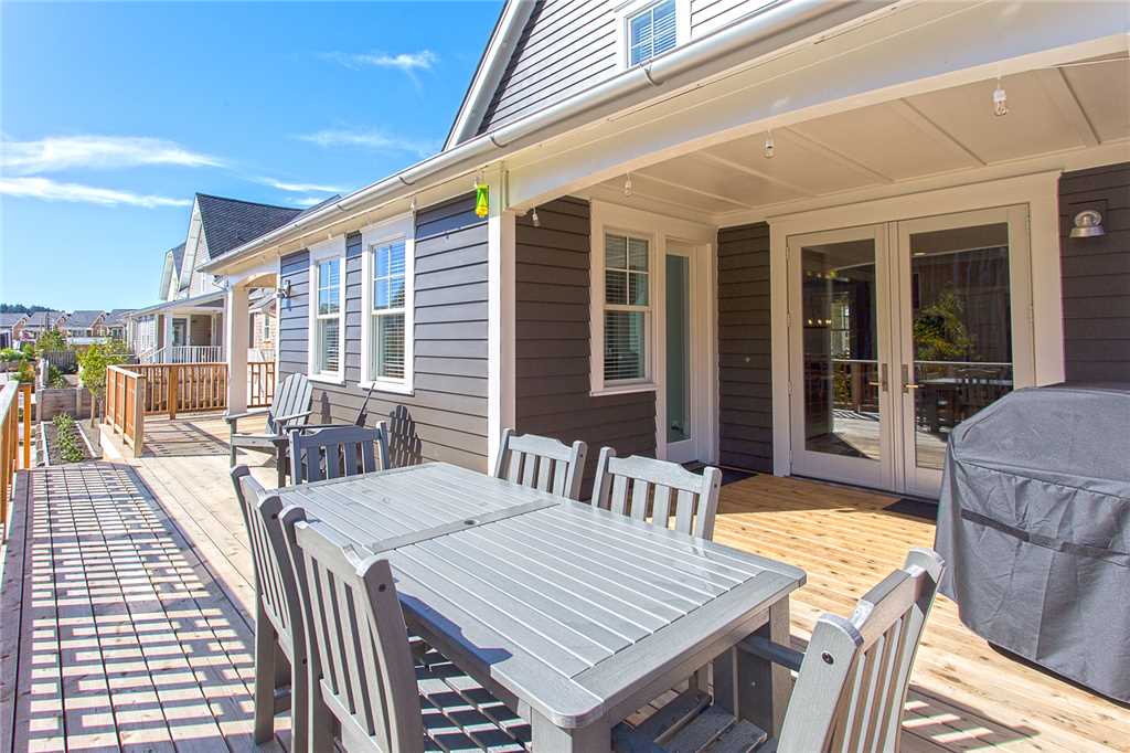 Enormous wrap around deck with outdoor eating space