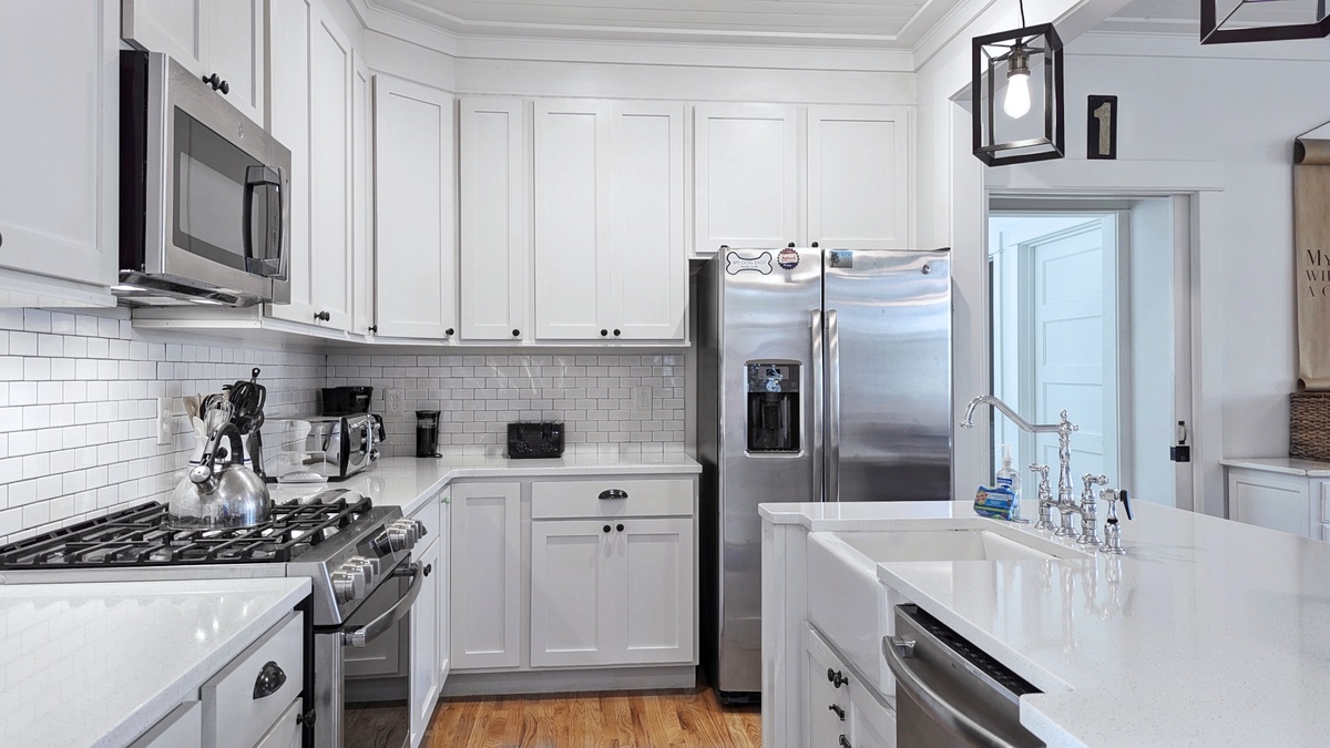 The kitchen is equipped with a gas range